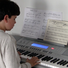 Patrick, age 9, at the piano